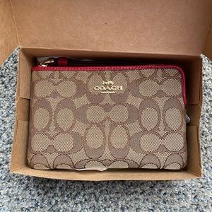 Coach wristlet wallet. Red and khaki Coach print. Brand new, never used.